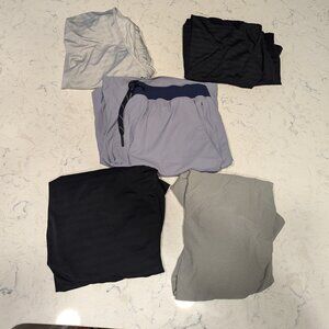 Rhone Bundle: Pursuit Short, Reign Shirt, Swift 2.0 Tanks, and Atmosphere Shirt